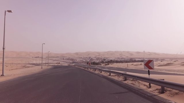 New road from Oasis Liwa to Moreeb Dune in Rub al Khali desert stock footage video