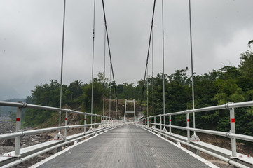 Fototapeta na wymiar Suspension bridge in Boyong village, Yogyakarta, Indonesia