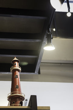 Lighthouse ceramic decorated on shelf