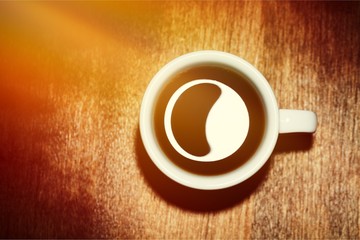 Coffee cup on desk