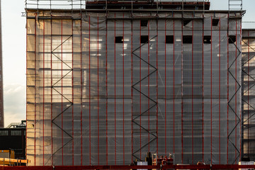 Obraz premium Construction scaffolding cover shut off industry