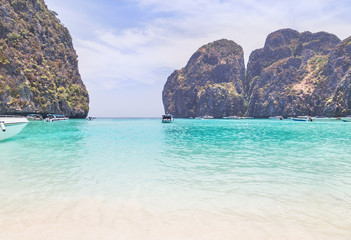 view of maya bay with limestone rock popular tropical beach in phi phi Island, krabi, thailand. 