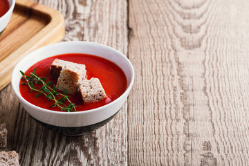 Tomato soup  with rye bread croutons and thyme