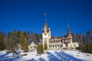Obraz premium Peles castle in Sinaia, Romania, Winter scene