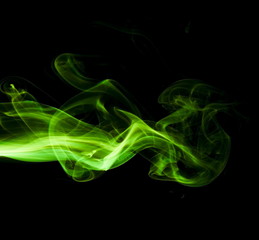 Green smoke on black background