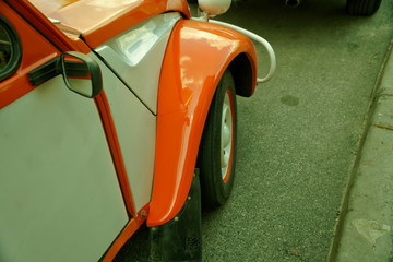 Front of red vintage car, business concept