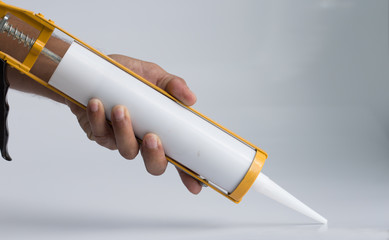 Glue gun for working with silicone adhesives and other construction fillers.