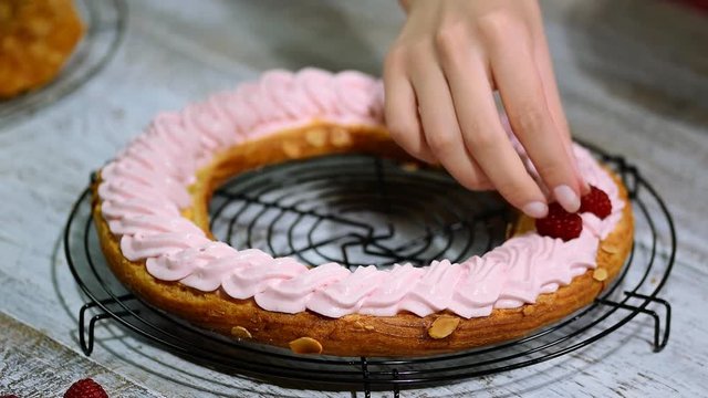 Preparation homemade choux pastry cake Paris Brest. French dessert.