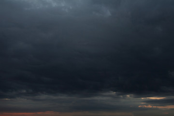 Dramatic cloudscape before sunrise early in a summer morning