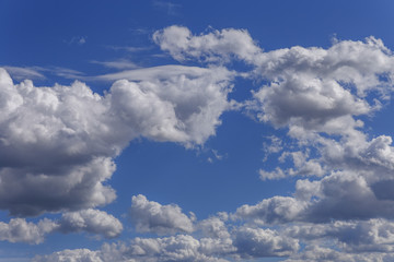 Beautiful blue sky with white clouds as a natural background.