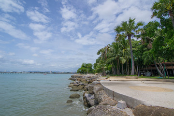 Bright scenic morning view of the boardwalk at Pattaya Beach in Thailand.