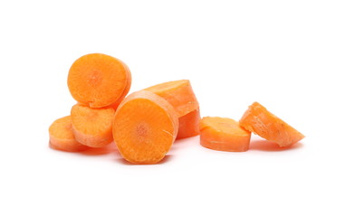 Carrots, slices pile isolated on white background 