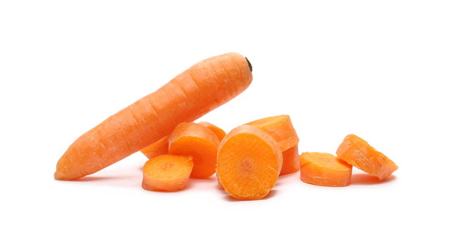 Carrots, slices pile isolated on white background 