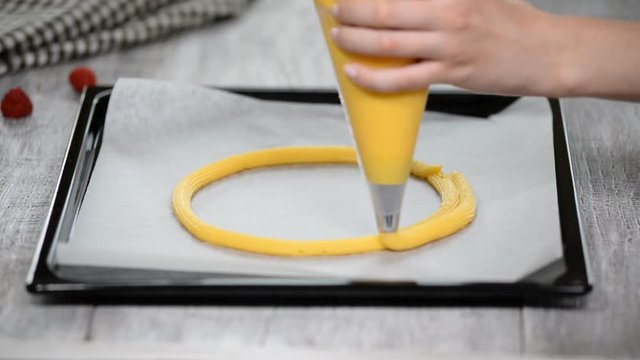 Eclair rings baking process. Making Paris Brest.