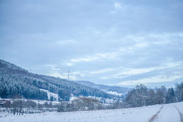 Snowy mountains in winter in Germany rural landscape
