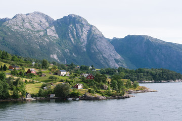 Fototapeta na wymiar Summer landscape with a Norway village