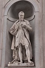 Fotobehang Oude meesters statue of Michelangelo on the facade of the Uffizi gallery in Florence, Italy  © ermess