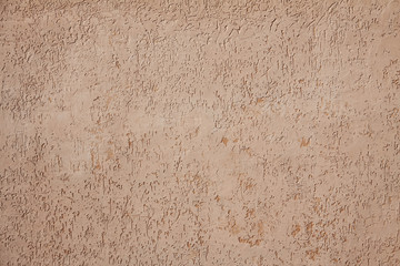 Fototapeta premium Beige cement plaster wall as background or texture.