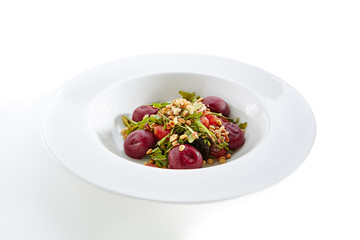 Salad with Grapefruit, Pine Nuts and Arugula Garnish with Beets Hemispheres