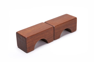 wood block make a something stacked  isolated white.