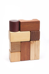 Obraz premium wood block make a something stacked isolated white.