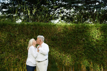 Kissing aged couple