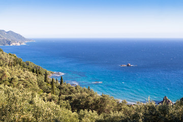 Fototapeta na wymiar Spectacular view and lush green of Palaiokastritsa, Corfu, Greece