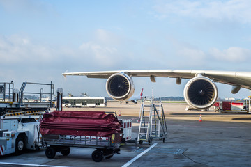 wing of the aircraft in the parking lot