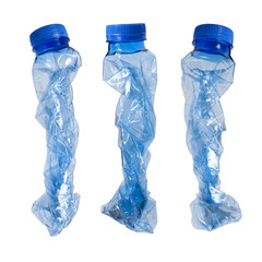 Used plastic water bottles prepared for recycling, isolated on white background