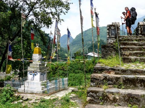 Looking to Stupa in Nepal - Annapurna trekking. Fringe of a town Besisahar in Nepal