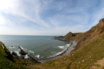 Speke's Mill Mouth,  Devon with Lundy Island on the horizon