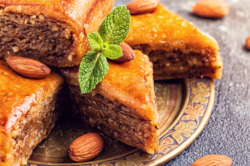 Homemade baklava with nuts and honey.