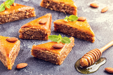 Homemade baklava with nuts and honey.