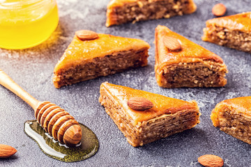 Homemade baklava with nuts and honey.