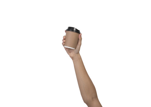 Hand holding coffee paper cup. mockup for creative design branding.