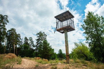 watch tower in a beautiful landscape on sky backround
