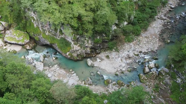 Colore, Bergamo, Italy. Dezzo creek at the bottom of steep rock cliffs and mountain ravine. Shoot from Via Mala an historical route in Scalve Valley