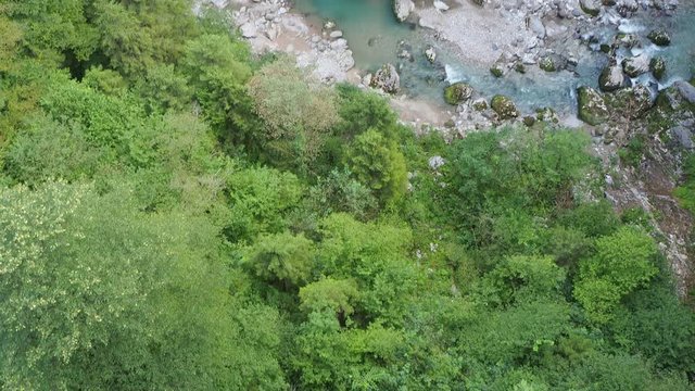 Colore, Bergamo, Italy. Dezzo creek at the bottom of steep rock cliffs and mountain ravine. Shoot from Via Mala an historical route in Scalve Valley