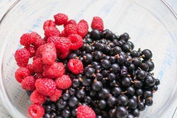 Berries of raspberries and black currants.