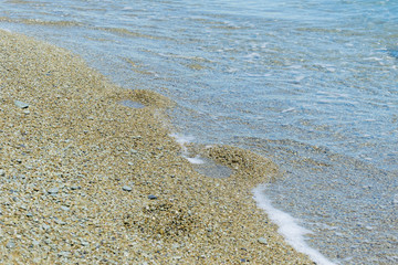 Sea waves on pebbles.