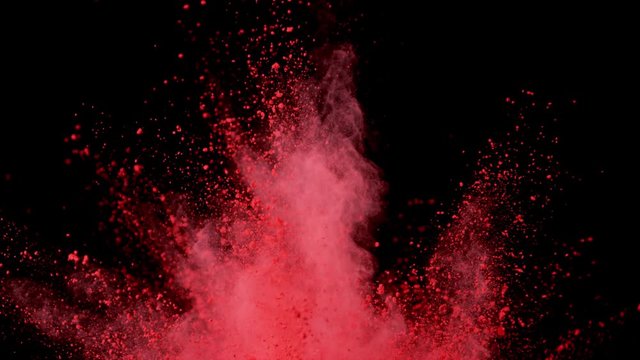 Super slow motion of colored powder explosion isolated on black background. Filmed on high speed camera, 1000 fps.