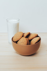 Cookies with a glass of milk on the table.
