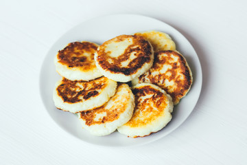 Obraz na płótnie Canvas Cheese pancake on the plate
