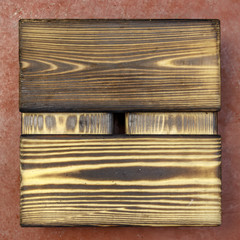 Stand from natural wood on a red background top view