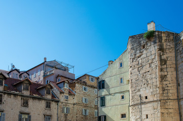 Fototapeta na wymiar View of houses against blue sky in Split old town, Croatia