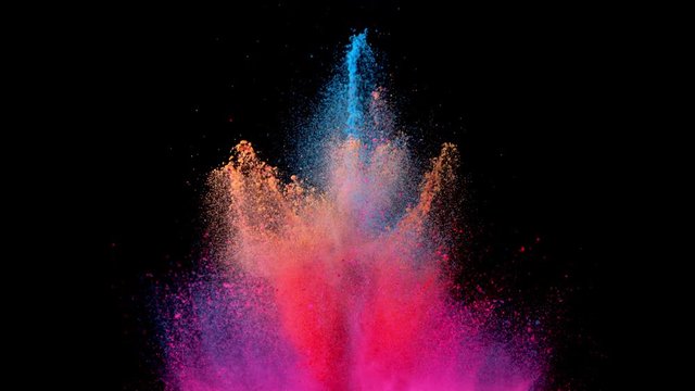 Super slow motion of coloured powder explosion isolated on black background. Filmed on high speed cinema camera Phantom VEO 4k, 1000fps.