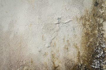 Old grunge wall texture stones and chipped rough background texture.