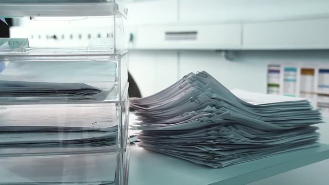 Stack of pappers in the office.