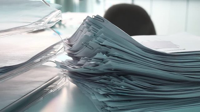 Stack of pappers in the office.