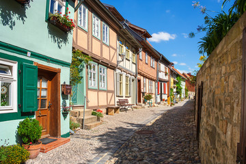 Fototapeta na wymiar Medieval old town street in Quedlinburg, World Heritage Site, Harz, Northern Germany